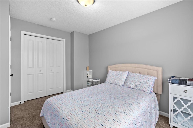 1272 Pheasant Run, New Richmond, WI 54017 - bedroom with carpet flooring, a closet, and a textured ceiling