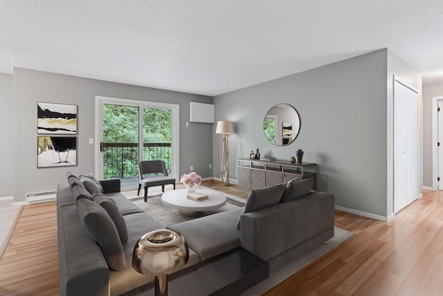 1573 Cohansey St Unit 205, Saint Paul, MN 55117 - living room with light wood-style floors and a baseboard radiator