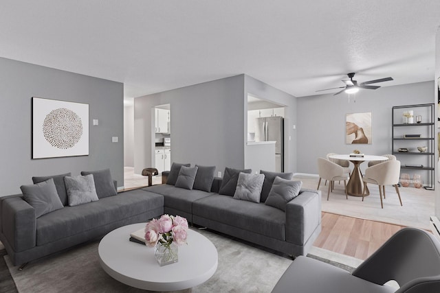 1573 Cohansey St Unit 205, Saint Paul, MN 55117 - living room featuring wood finished floors and a ceiling fan