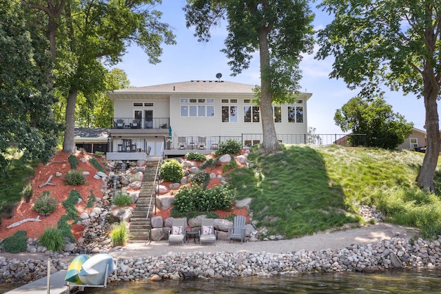 70348 219th St, Dassel, MN 55325 - back of house with stairway and a deck