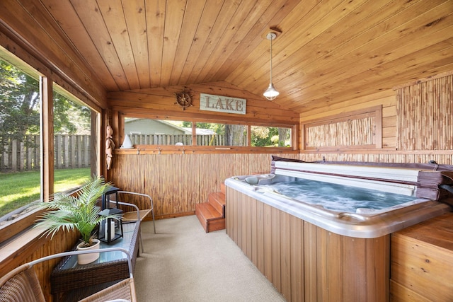 70348 219th St, Dassel, MN 55325 - miscellaneous room with a hot tub, vaulted ceiling, wood walls, light carpet, and wood ceiling