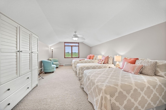70348 219th St, Dassel, MN 55325 - carpeted bedroom featuring vaulted ceiling, a baseboard heating unit, and ceiling fan