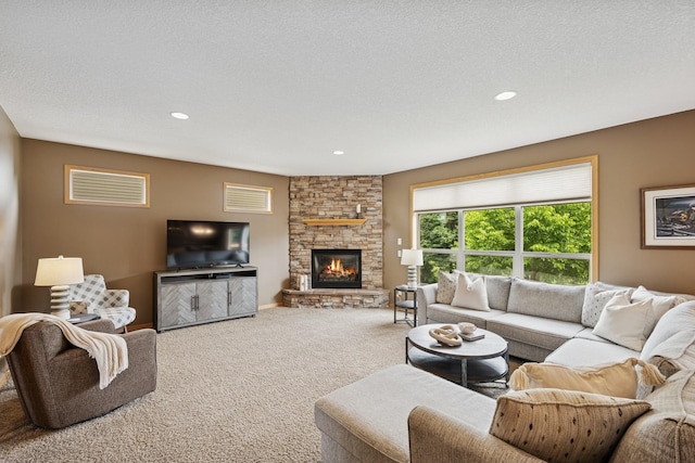 15807 Martin St NW, Andover, MN 55304 - carpeted living area featuring a fireplace and recessed lighting