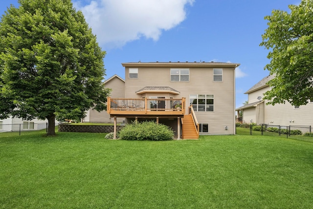 15807 Martin St NW, Andover, MN 55304 - rear view of house featuring a deck, stairs, and a fenced backyard