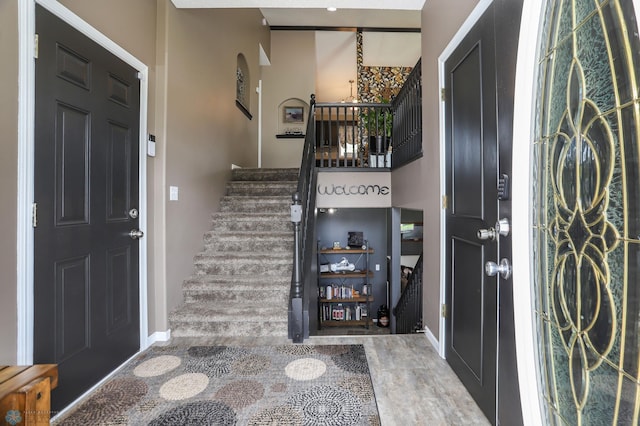 4450 48th St S, Fargo, ND 58104 - foyer featuring stairs and arched walkways