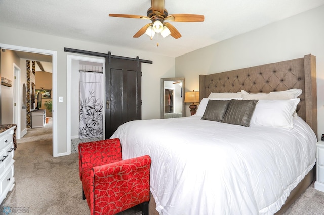 4450 48th St S, Fargo, ND 58104 - carpeted bedroom featuring a barn door and ceiling fan