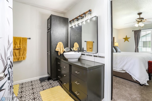 4450 48th St S, Fargo, ND 58104 - bathroom with ensuite bathroom, vanity, and a ceiling fan
