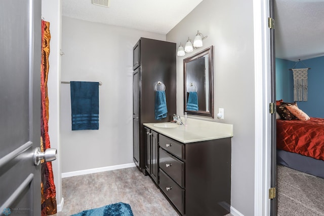 4450 48th St S, Fargo, ND 58104 - ensuite bathroom featuring vanity and baseboards