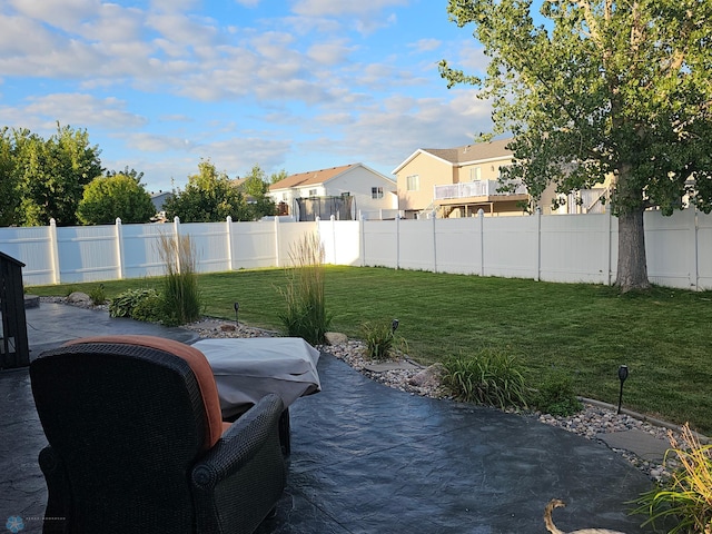4450 48th St S, Fargo, ND 58104 - fenced backyard featuring a patio area and a residential view