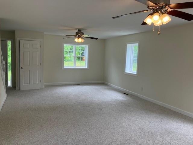 34358 State Highway 18, Finlayson Twp, MN 55735 - carpeted empty room with plenty of natural light and a ceiling fan