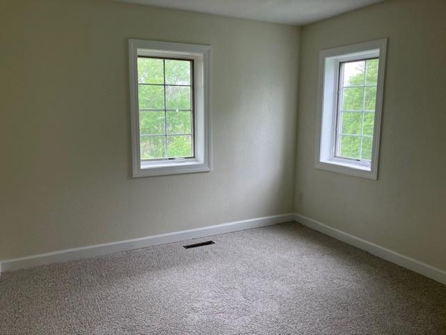 34358 State Highway 18, Finlayson Twp, MN 55735 - carpeted spare room featuring baseboards