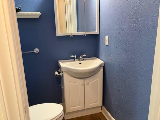 34358 State Highway 18, Finlayson Twp, MN 55735 - bathroom with toilet and vanity