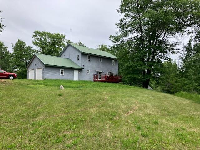 34358 State Highway 18, Finlayson Twp, MN 55735 - rear view of house featuring a lawn and a wooden deck