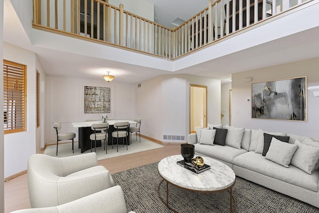 1900 Hunter Hill Rd, Hudson, WI 54016 - living area with wood finished floors and a towering ceiling