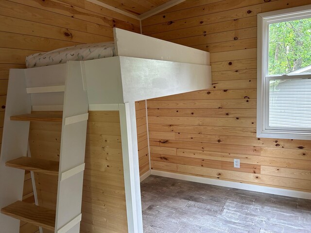 6274 Azalea Rd, Motley Twp, MN 56466 - bonus room featuring wood walls and wood finished floors