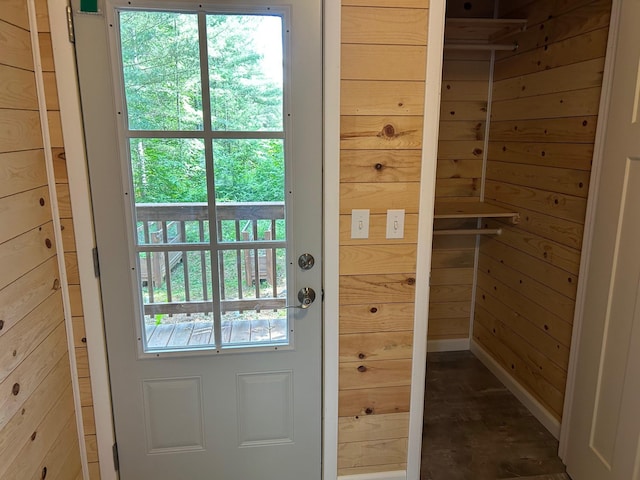 6274 Azalea Rd, Motley Twp, MN 56466 - doorway to outside featuring wooden walls
