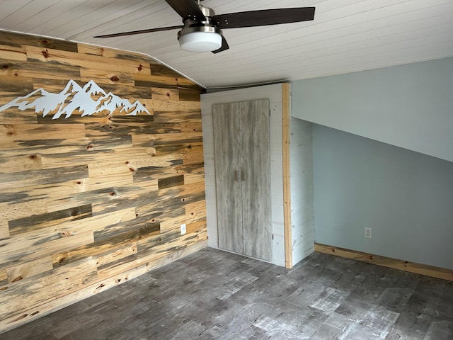 6274 Azalea Rd, Motley Twp, MN 56466 - unfurnished bedroom with vaulted ceiling, wood walls, wooden ceiling, wood finished floors, and a ceiling fan