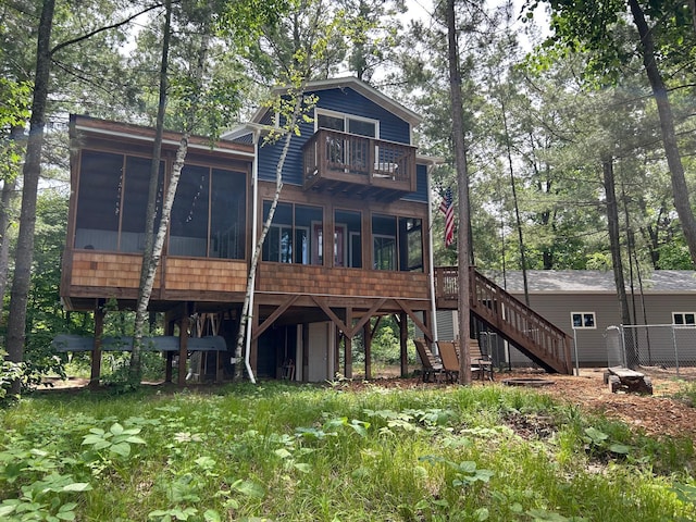 6274 Azalea Rd, Motley Twp, MN 56466 - back of house with a balcony, a sunroom, and stairs