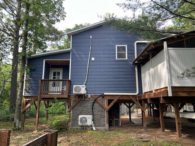 6274 Azalea Rd, Motley Twp, MN 56466 - back of property with a deck, stone siding, and stairway
