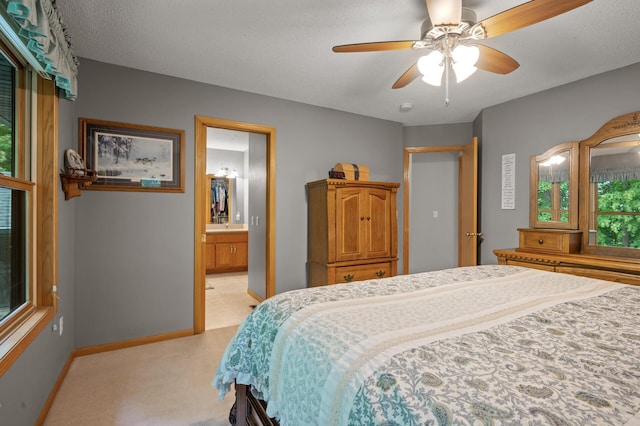 11770 N Meadow Curv, Lindstrom, MN 55045 - bedroom featuring light colored carpet, ensuite bath, and ceiling fan