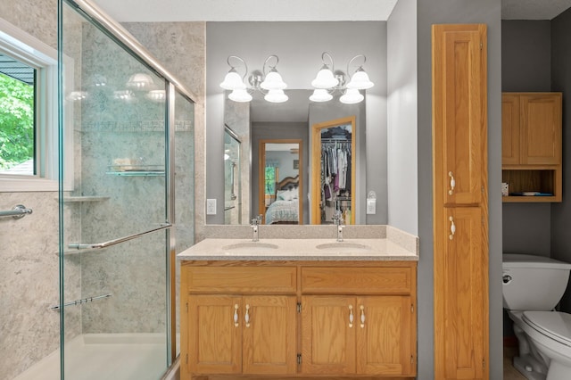 11770 N Meadow Curv, Lindstrom, MN 55045 - ensuite bathroom with a stall shower, a closet, double vanity, and a chandelier