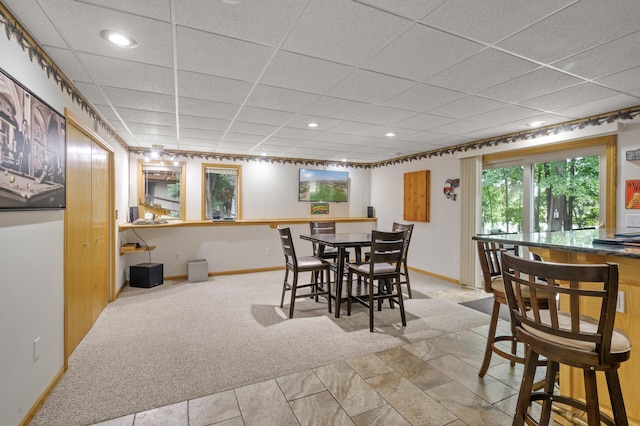 11770 N Meadow Curv, Lindstrom, MN 55045 - dining area with carpet flooring, a drop ceiling, and recessed lighting