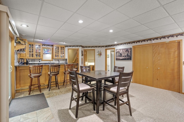 11770 N Meadow Curv, Lindstrom, MN 55045 - dining space with wet bar, recessed lighting, a drop ceiling, and light carpet