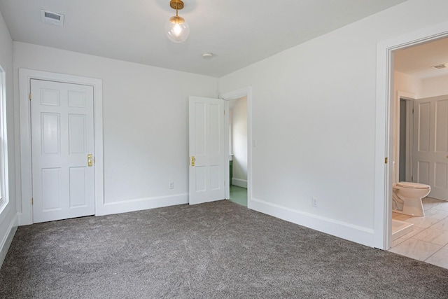 322 Jefferson St, Caledonia, MN 55921 - unfurnished bedroom with carpet and connected bathroom