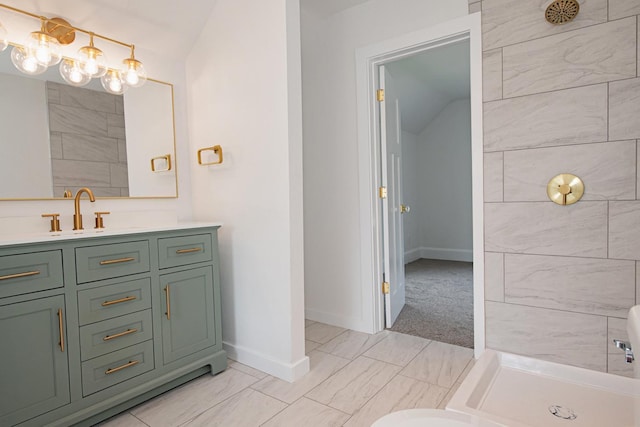 322 Jefferson St, Caledonia, MN 55921 - bathroom with marble look tiles, vanity, a chandelier, and vaulted ceiling