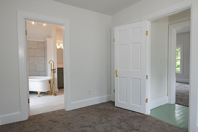 322 Jefferson St, Caledonia, MN 55921 - unfurnished bedroom with carpet flooring and ensuite bath