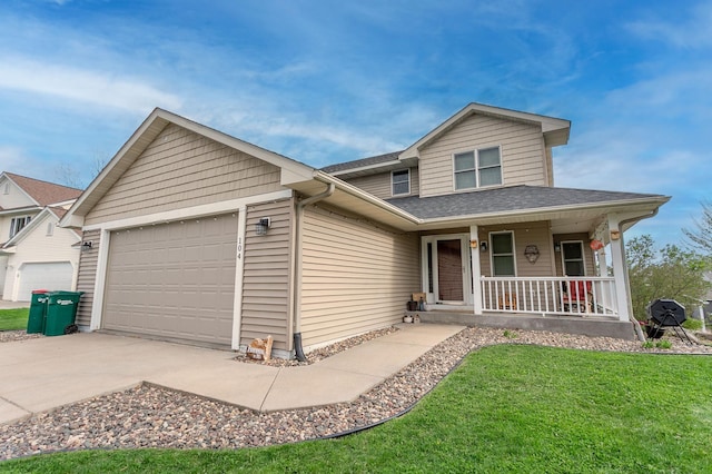 104 Sylla St, River Falls, WI 54022 - view of front of property with covered porch, an attached garage, driveway, a front lawn, and roof with shingles