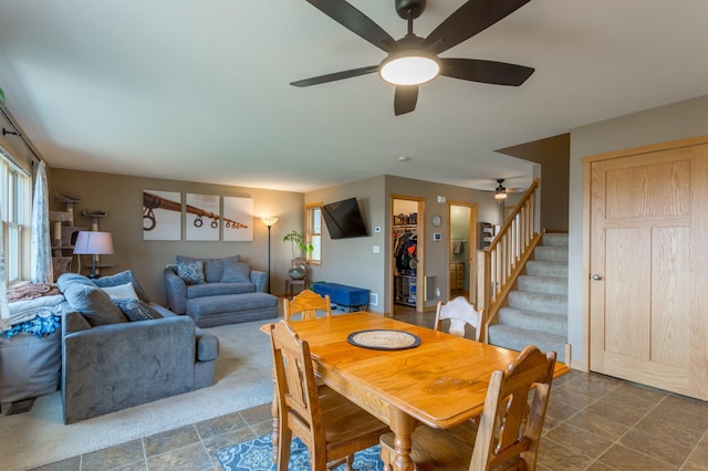 104 Sylla St, River Falls, WI 54022 - dining area with ceiling fan, stairway, and plenty of natural light