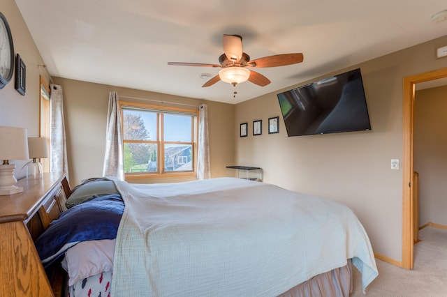 104 Sylla St, River Falls, WI 54022 - bedroom featuring light carpet and a ceiling fan