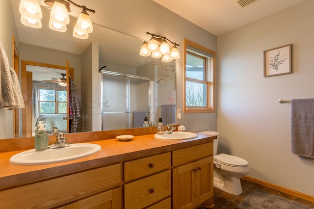 104 Sylla St, River Falls, WI 54022 - full bath featuring double vanity, a shower stall, and tile patterned flooring