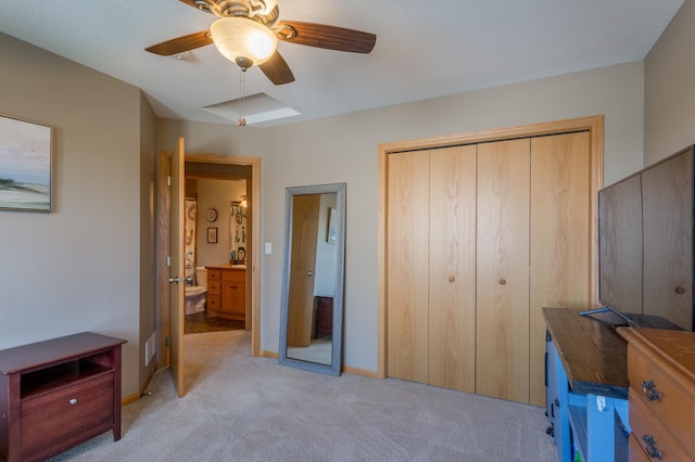 104 Sylla St, River Falls, WI 54022 - bedroom with light colored carpet, a closet, and ceiling fan