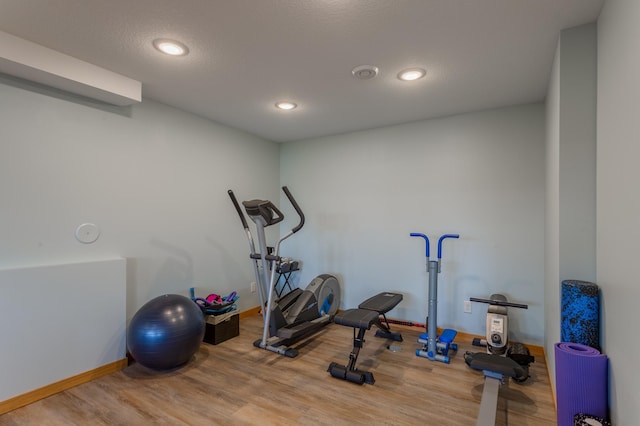 104 Sylla St, River Falls, WI 54022 - exercise room with wood finished floors and recessed lighting
