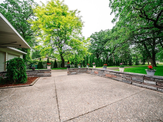 8585 Ilex Pl NW, Rice, MN 56367 - view of community with a patio area
