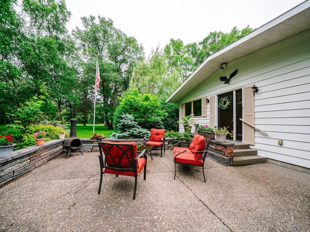 8585 Ilex Pl NW, Rice, MN 56367 - view of patio featuring entry steps and view of wooded area