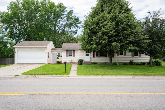 111 4th St N, Grove City, MN 56243 - view of front of property featuring concrete driveway and an attached garage