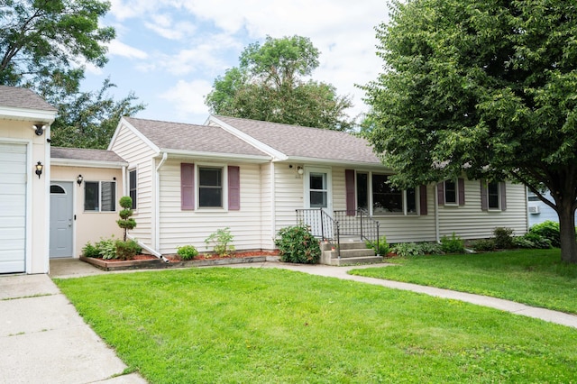 111 4th St N, Grove City, MN 56243 - ranch-style home with a front yard and roof with shingles