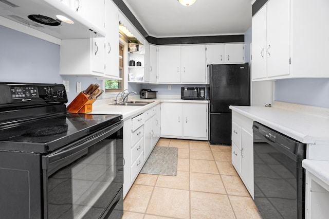 111 4th St N, Grove City, MN 56243 - kitchen with black appliances, light countertops, white cabinetry, and open shelves