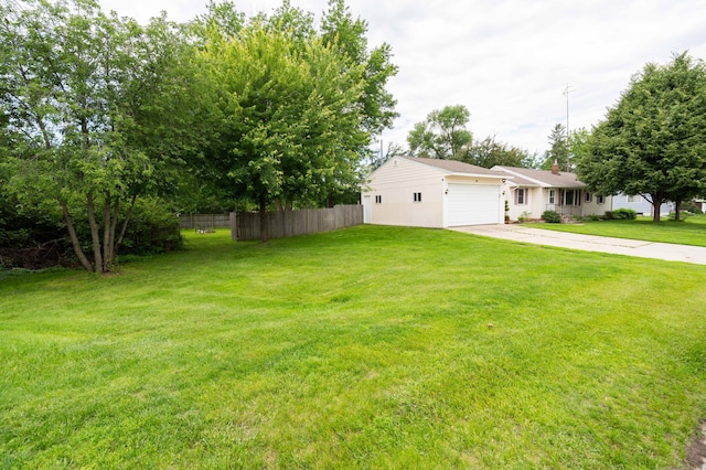 111 4th St N, Grove City, MN 56243 - view of yard featuring a garage and driveway