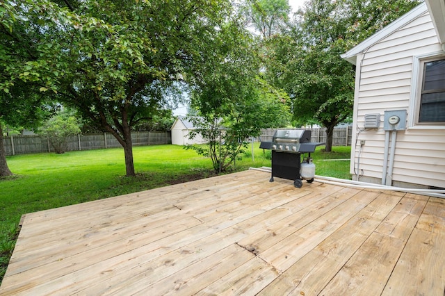 111 4th St N, Grove City, MN 56243 - deck featuring a fenced backyard and a grill