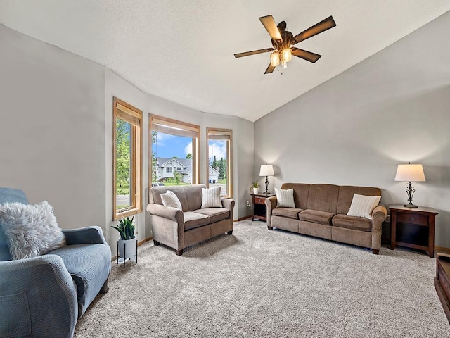 6735 378th St, North Branch, MN 55056 - living room with light colored carpet, ceiling fan, and lofted ceiling