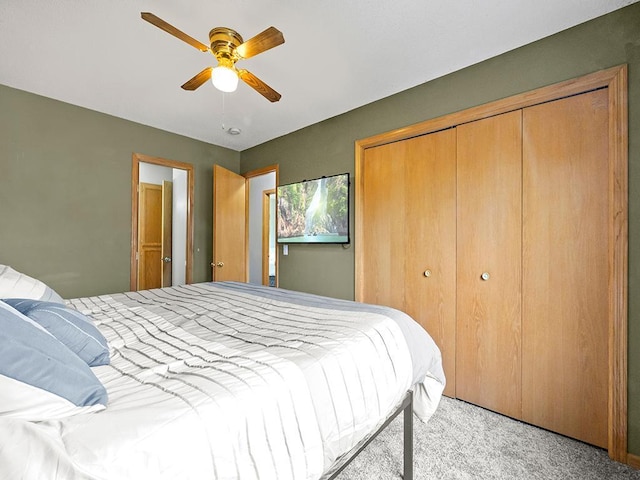 6735 378th St, North Branch, MN 55056 - bedroom with light colored carpet, a closet, and ceiling fan