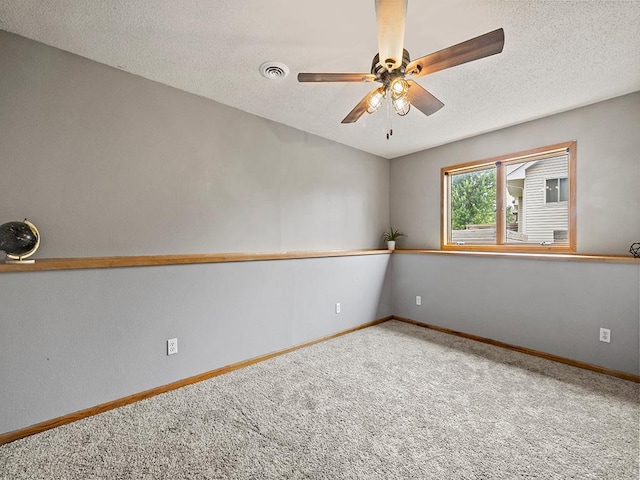 6735 378th St, North Branch, MN 55056 - carpeted spare room with a ceiling fan and a textured ceiling