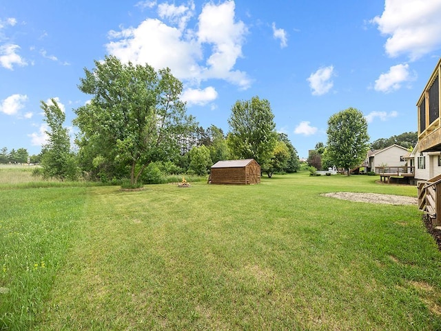 6735 378th St, North Branch, MN 55056 - view of green lawn with a storage unit