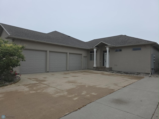 716 Northridge Way W, Fargo, ND 58078 - ranch-style home with driveway, a garage, stucco siding, and a shingled roof