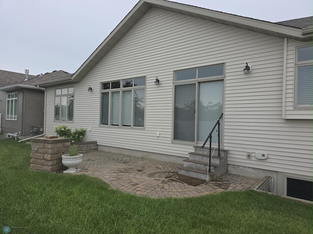 716 Northridge Way W, Fargo, ND 58078 - rear view of house with entry steps and a yard