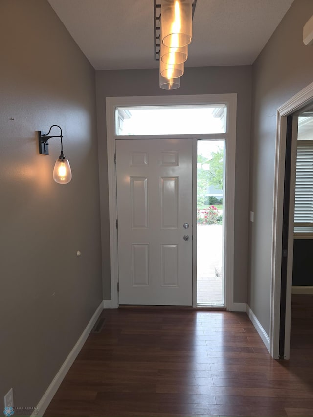 716 Northridge Way W, Fargo, ND 58078 - foyer featuring wood finished floors and baseboards